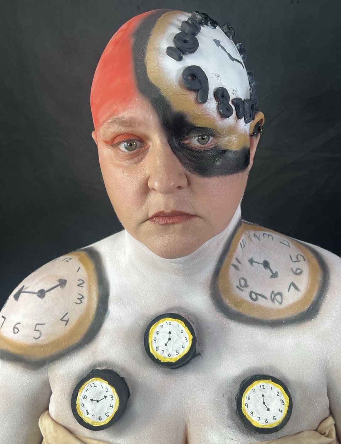 Out of this world look — half human, half clock